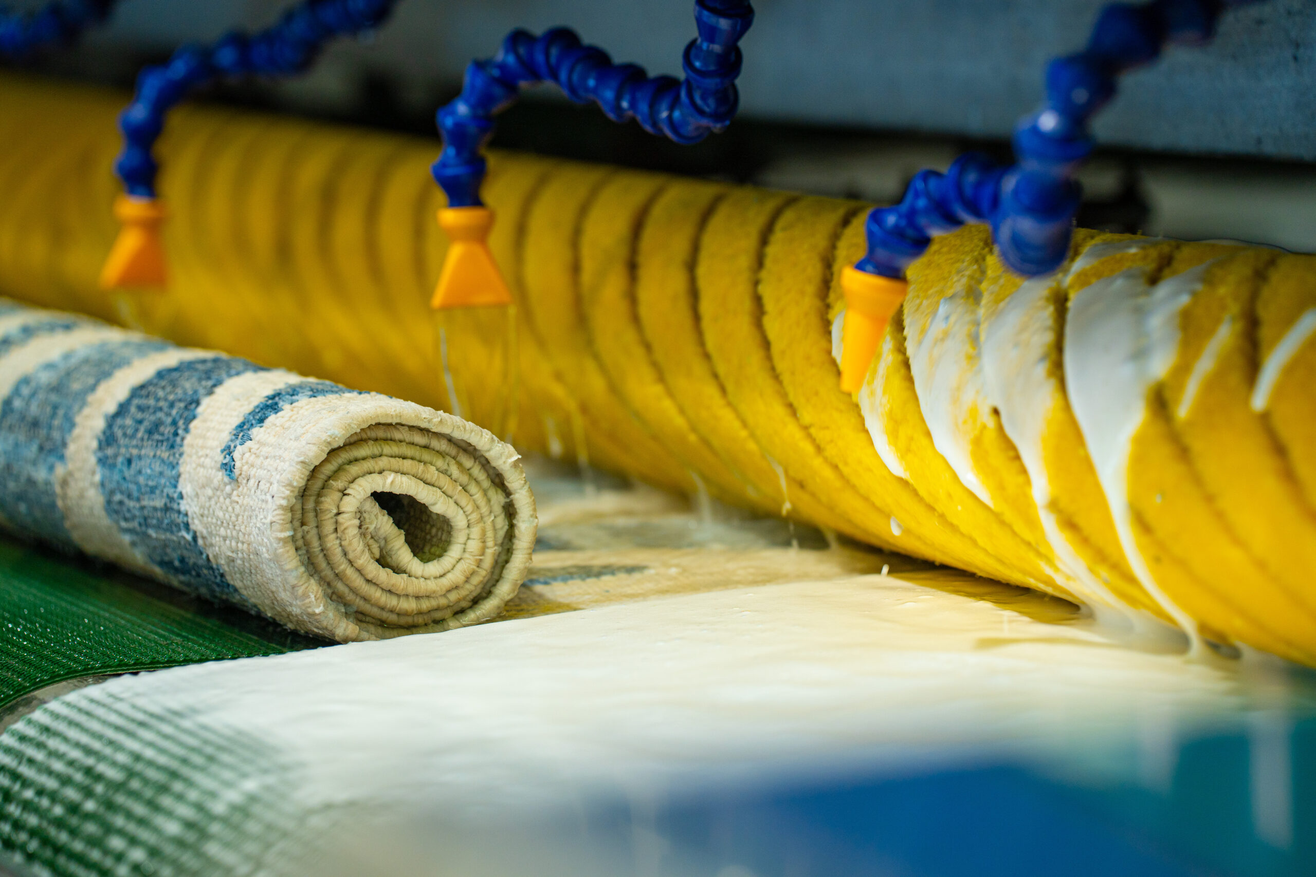 Rug being treated with a complete washing process.